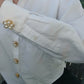Felicia – Gold Framed Pearl Flower Button Charm Gold