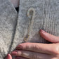 Crystal Fashion Safety Pin Gold The Shoelace Brand close up on cardigan