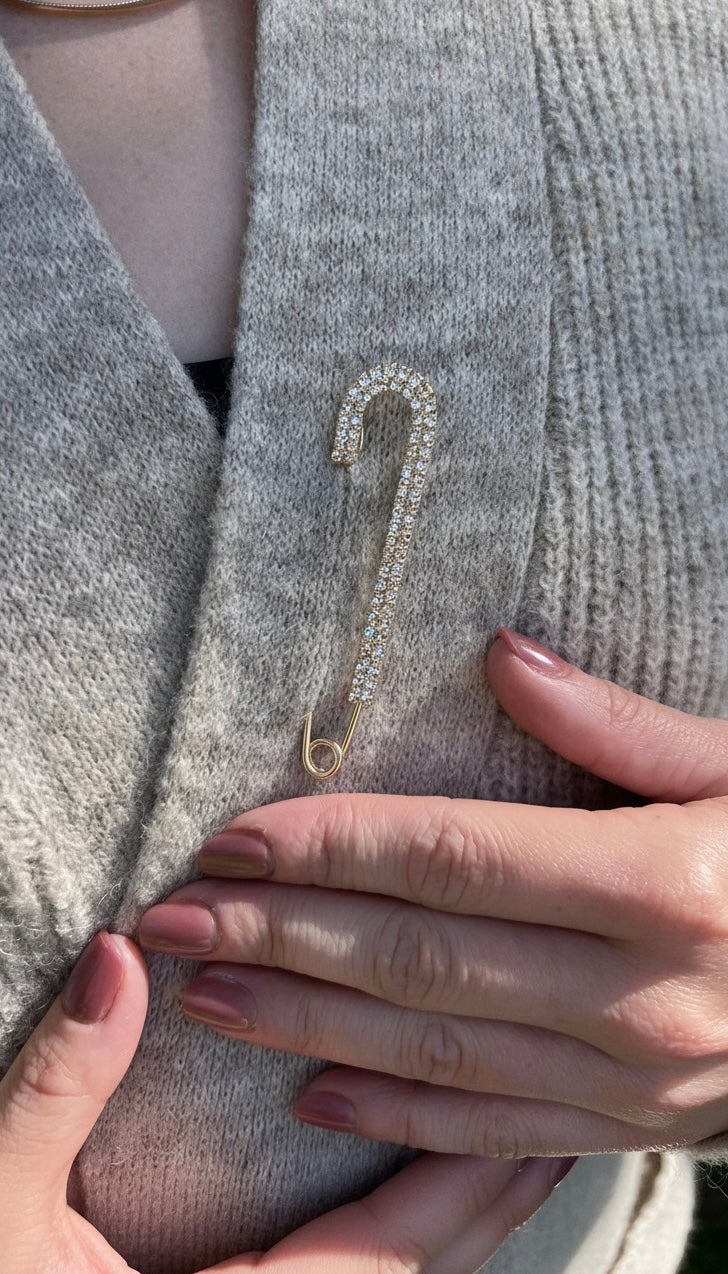 Crystal Fashion Safety Pin Gold The Shoelace Brand close up on cardigan