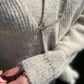 Crystal Fashion Safety Pin Gold The Shoelace Brand nice close up in cardigan