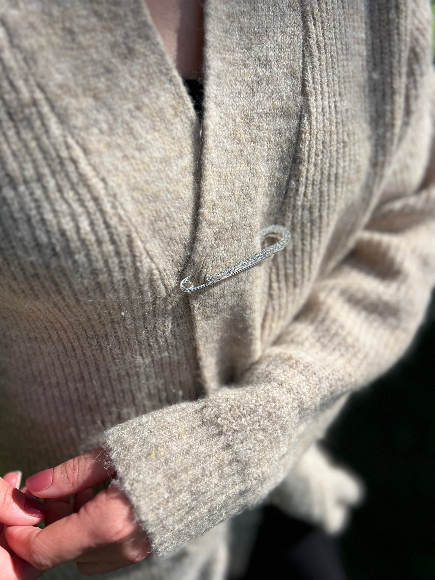Crystal Fashion Safety Pin Silver The Shoelace Brand close up in jacket