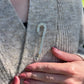 Crystal Fashion Safety Pin Silver The Shoelace Brand close up in knitwear