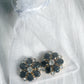 Maja – Black & White Flower Button Charm Gold