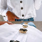 Button cover in black and white crystals close up and on shirt