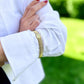 Shirt Sleeve Holder Gold elastic The Shoelace Brand on arm