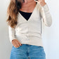 Rosi Button Cover on a beige cardigan